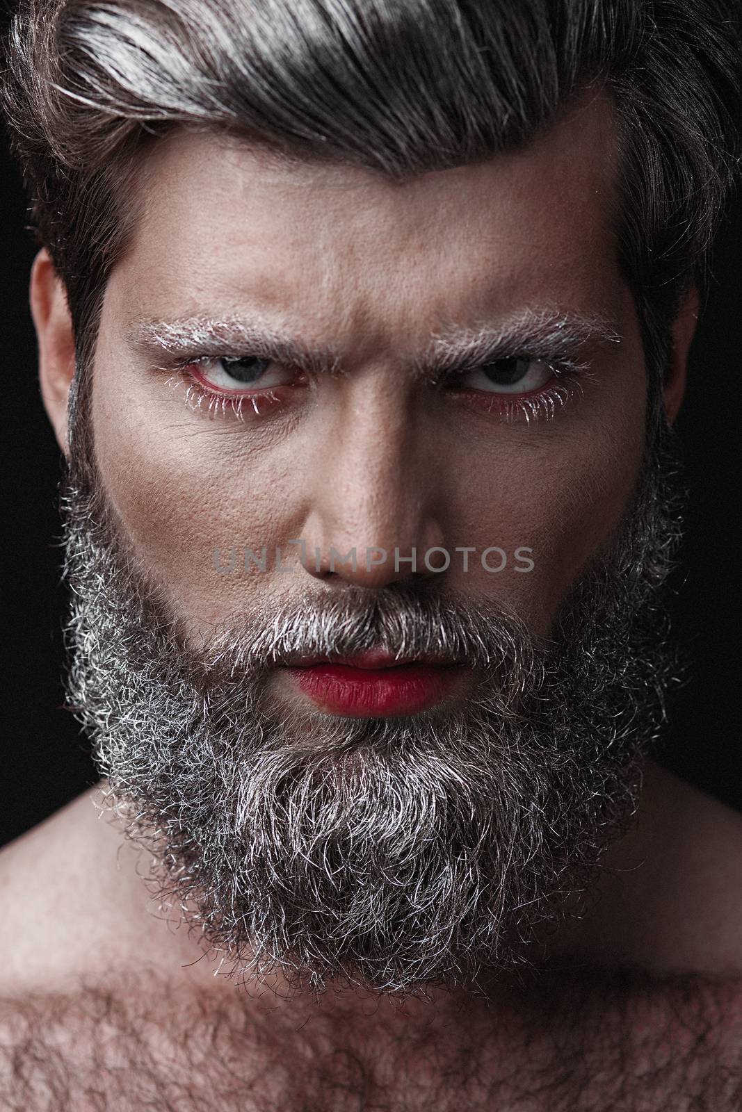 Creative Portrait of grey-haired fashionable man with red lips and tongue