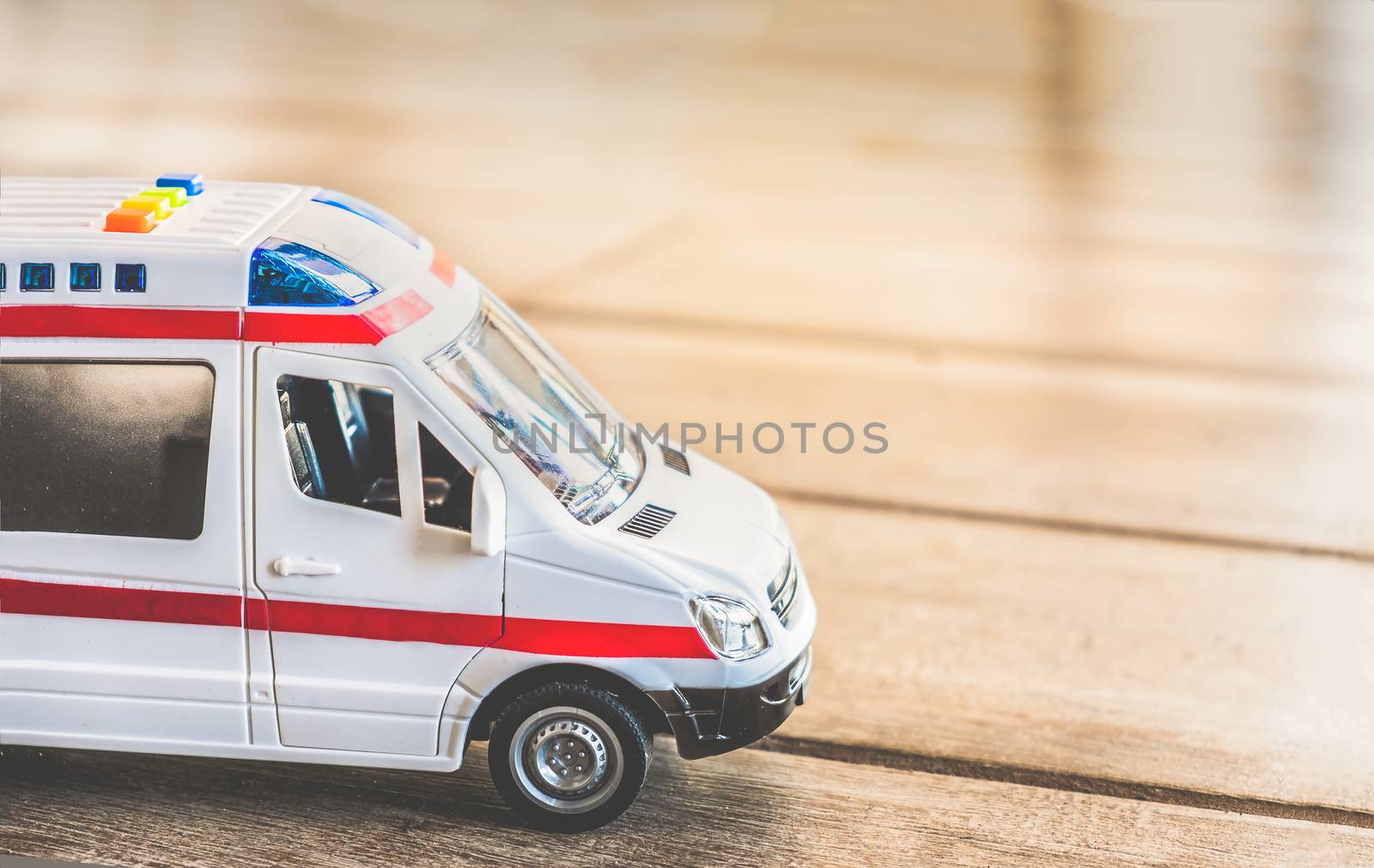 ambulance side view background health care toy close up .