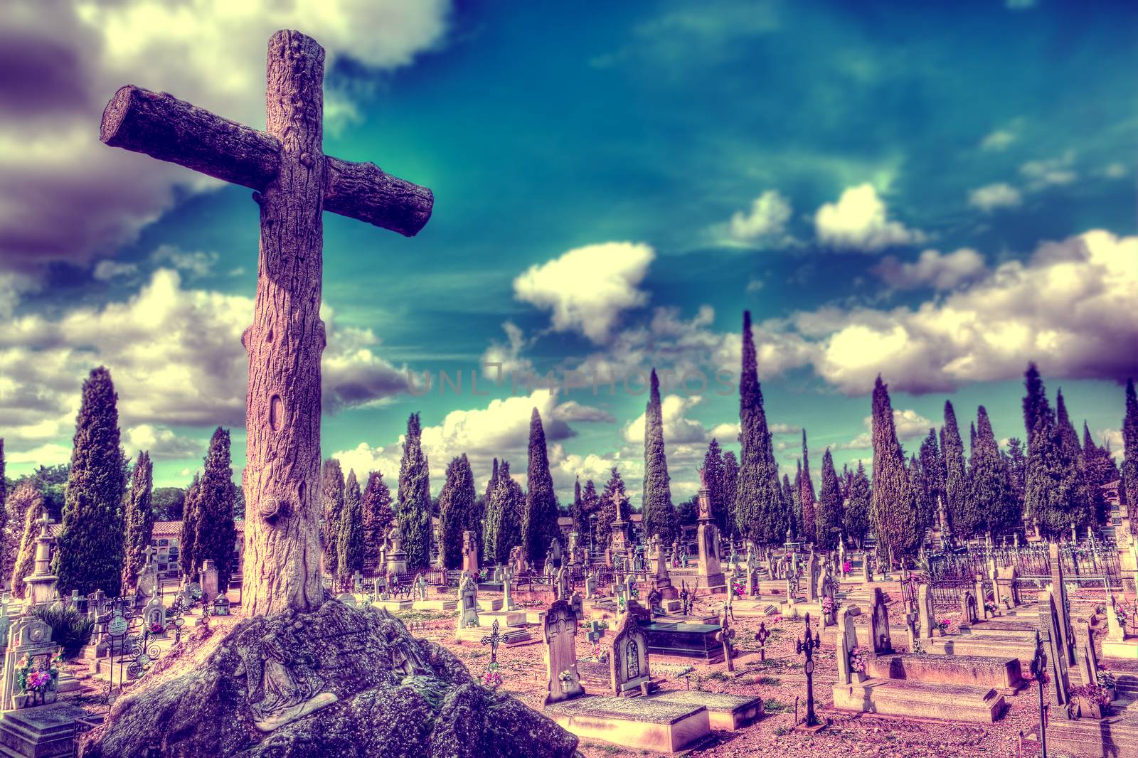Scenic cemetery  and tombstone.Gravestone and Halloween background.Surreal graveyard.