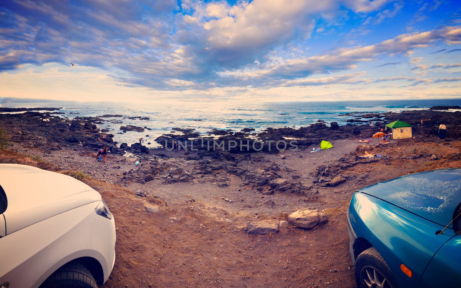 seascape scenery and car.Travel adventures.Sunset and scenic water landscape.