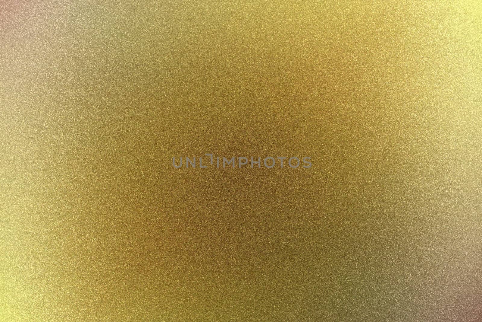 Brushed yellow metallic sheet surface, abstract texture background