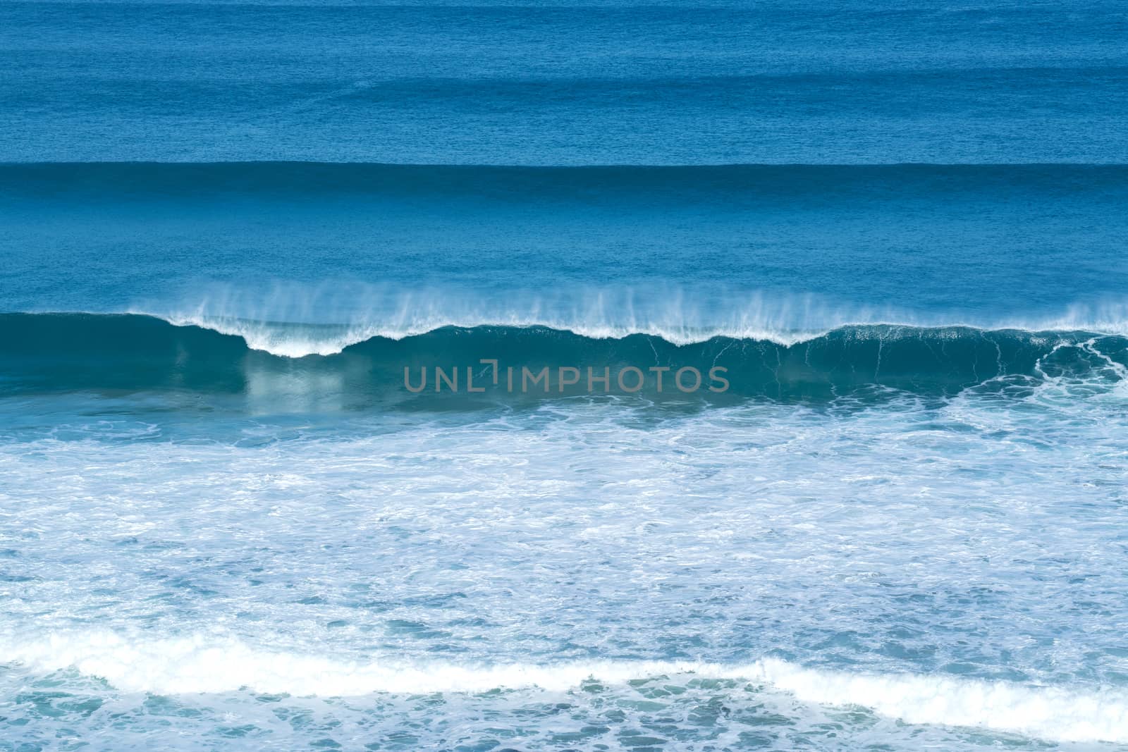 scene of the ocean with small waves