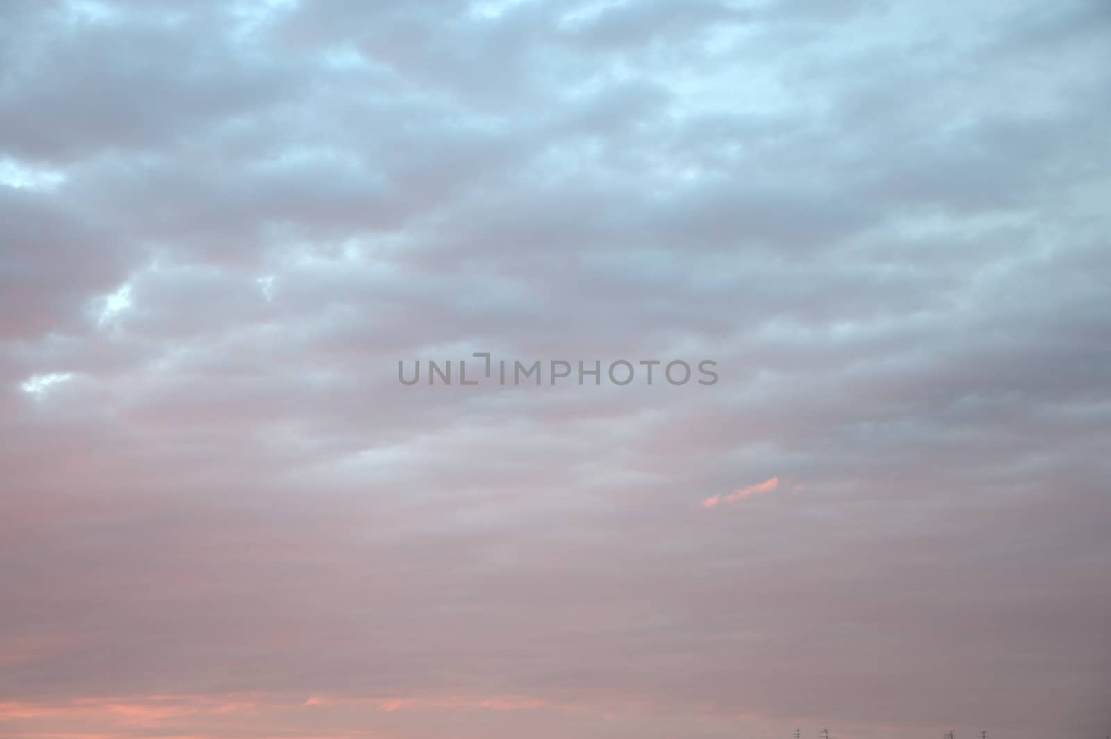 Thunderclouds at sunset painted in scarlet. Nature, cloudscape. by alexey_zheltukhin