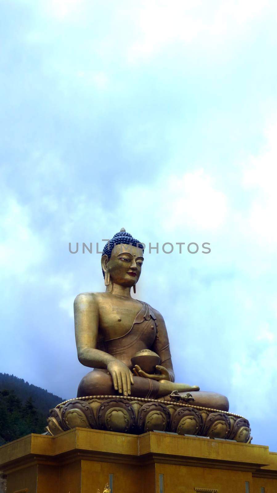 The Buddha Dordenma with the tallest statue of Buddha towering over a beautiful value in Thimpu, Bhutan.
