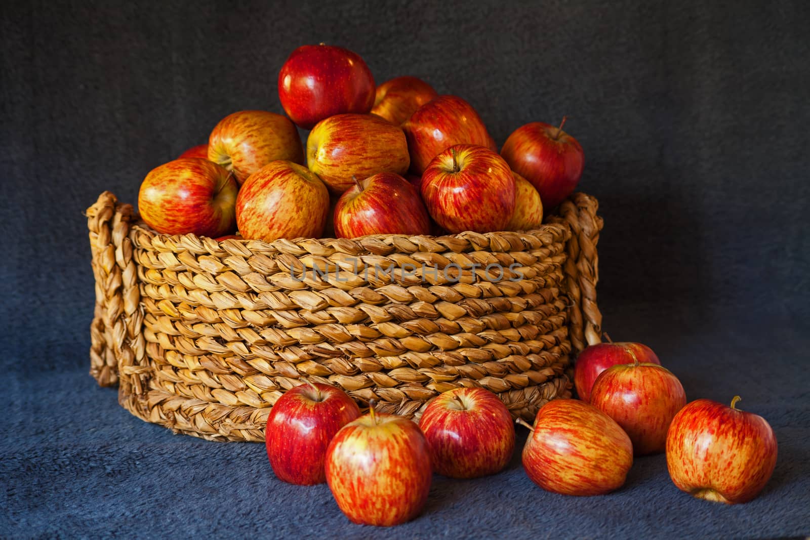 A grass  basket of red Starking apples 2 by kobus_peche