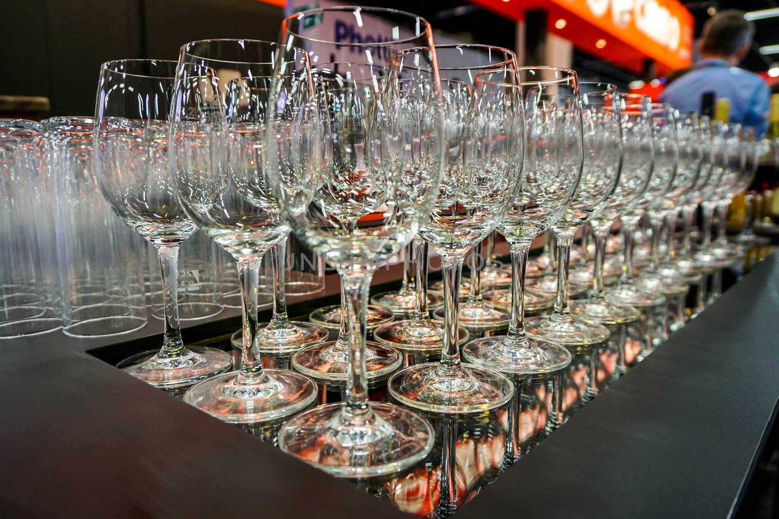 COLOGNE, GERMANY - SEPTEMBER 21, 2016: Photokina Exhibition interior. The Photokina is the world's largest trade fair for the photographic and imaging industries. Wine glasses in reataurant at the Photokina Exhibition. 