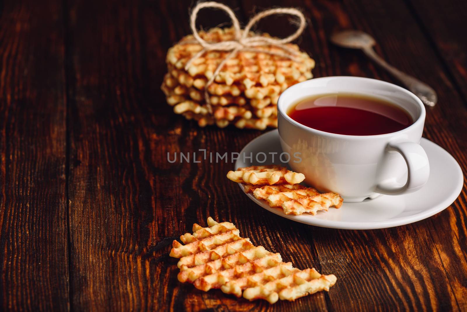 Dessert with Cup of Tea and Waffles. Copy Space on The Left.