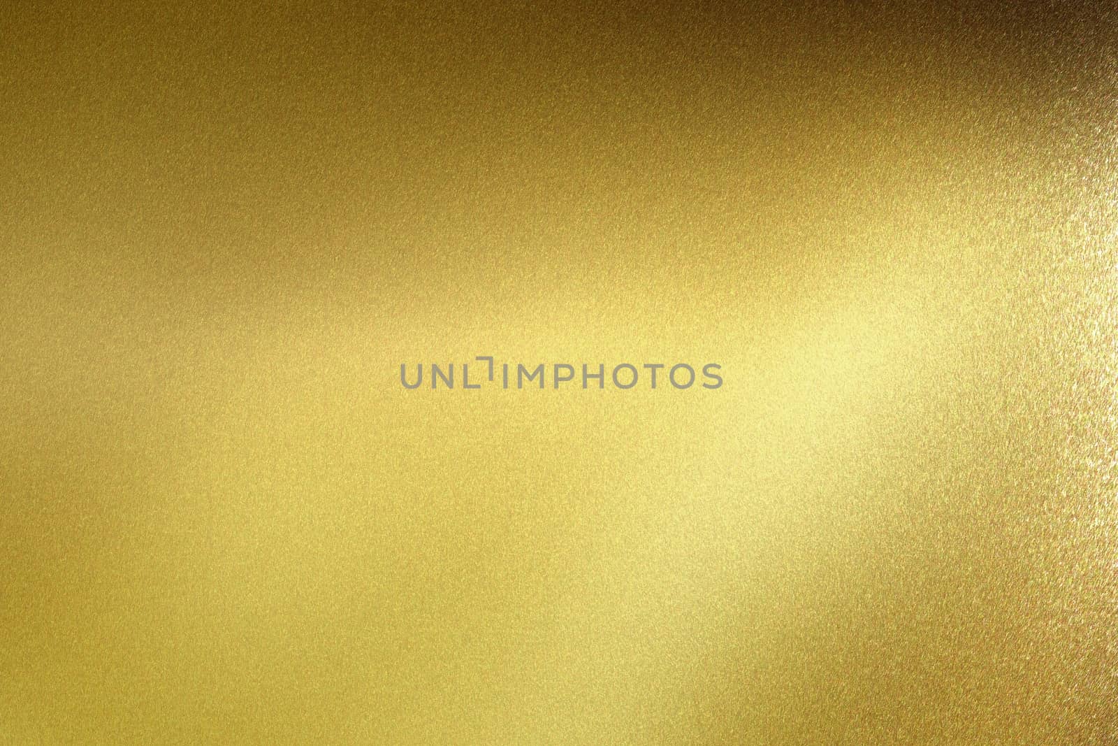 Glowing polished golden metal wall, abstract texture background