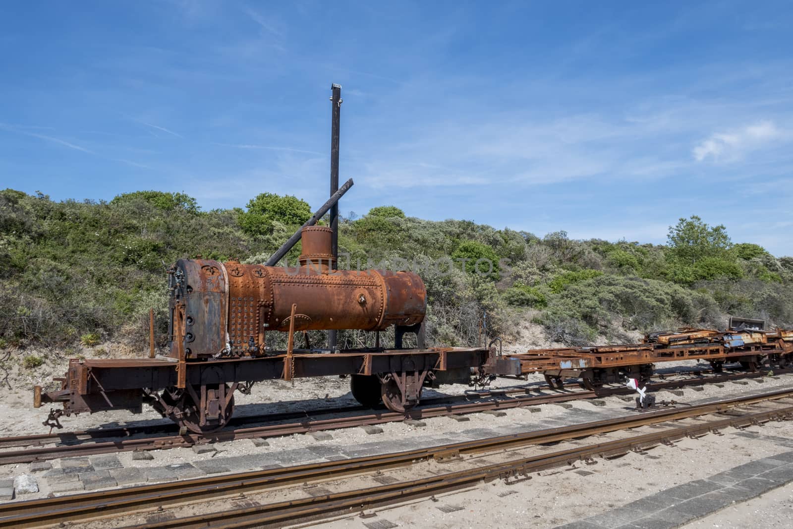 old rusted steam vessel used for trains in museum in ouddorp holland
