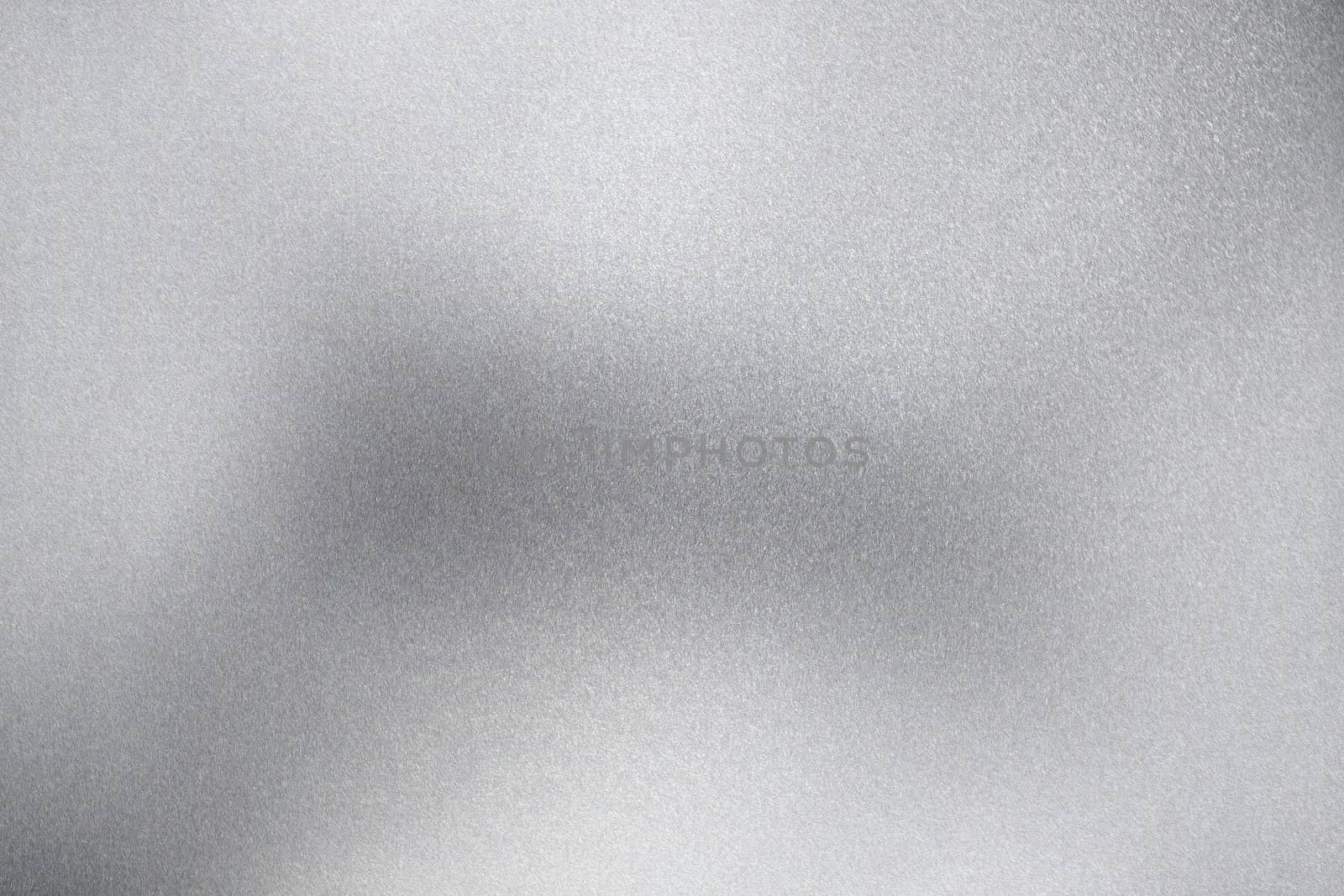 Glowing polished silver steel plate, abstract texture background