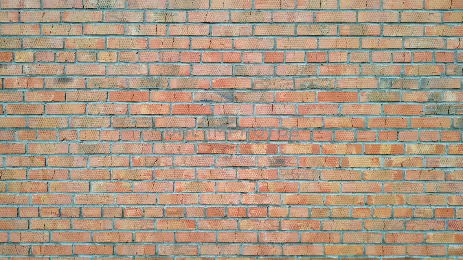 Old bricks wall, taken in the street on a cloudy day close-up. Background. Texture.