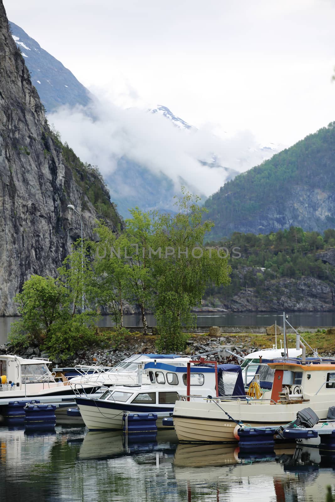 Fishing boats in Norway fjord by destillat