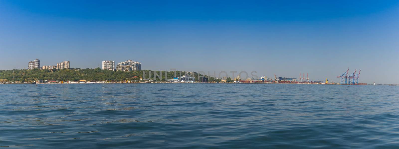 Odessa, Ukraine - 08.28.2018. Coast of Odessa city, Ukraine. Panoramic view from the sea in a sunny summer day.