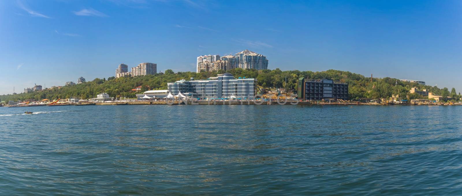 Odessa, Ukraine - 08.28.2018. Coast of Odessa city, Ukraine. Panoramic view from the sea in a sunny summer day.