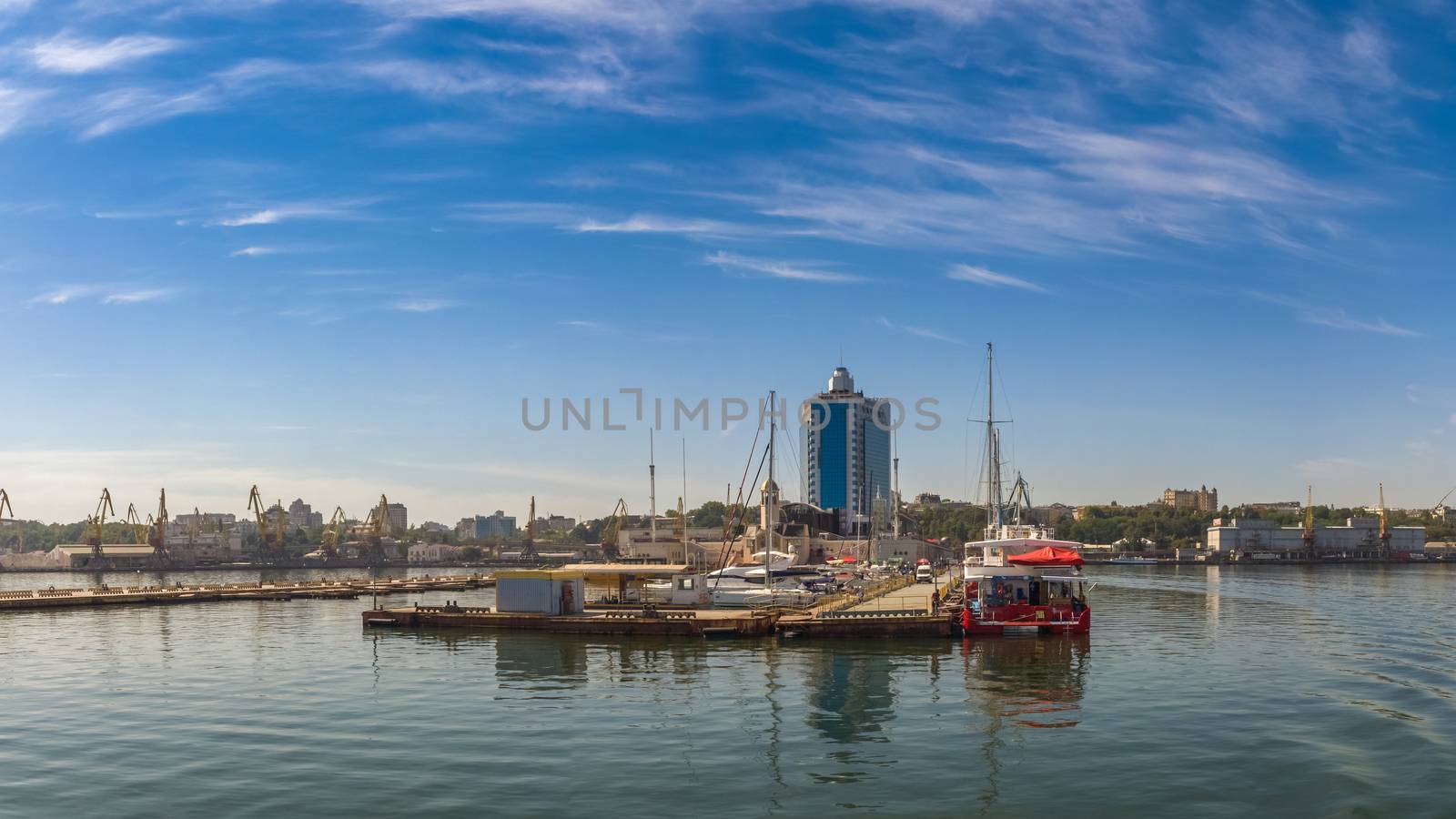 Odessa, Ukraine - 08.28.2018. Coast of Odessa city, Ukraine. Panoramic view from the sea in a sunny summer day.