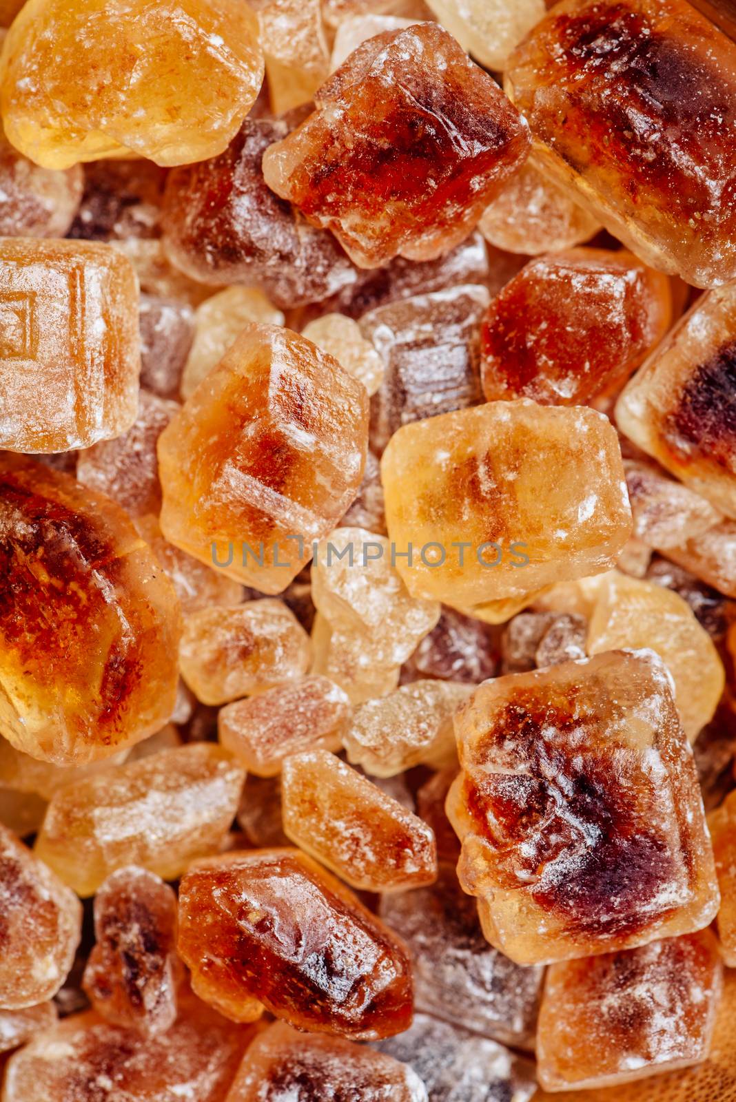 Textured Background of Candy Brown Sugar. Vertical Orientation.