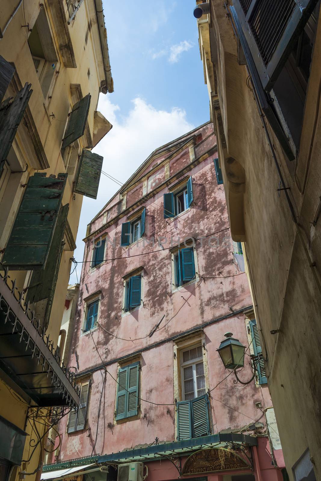 Greek alley on the Corfu island in Corfu town by ankarb