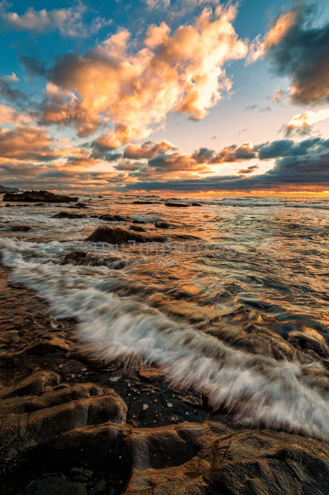 A Dramatic Sunset at the Beach, Color Image by backyard_photography