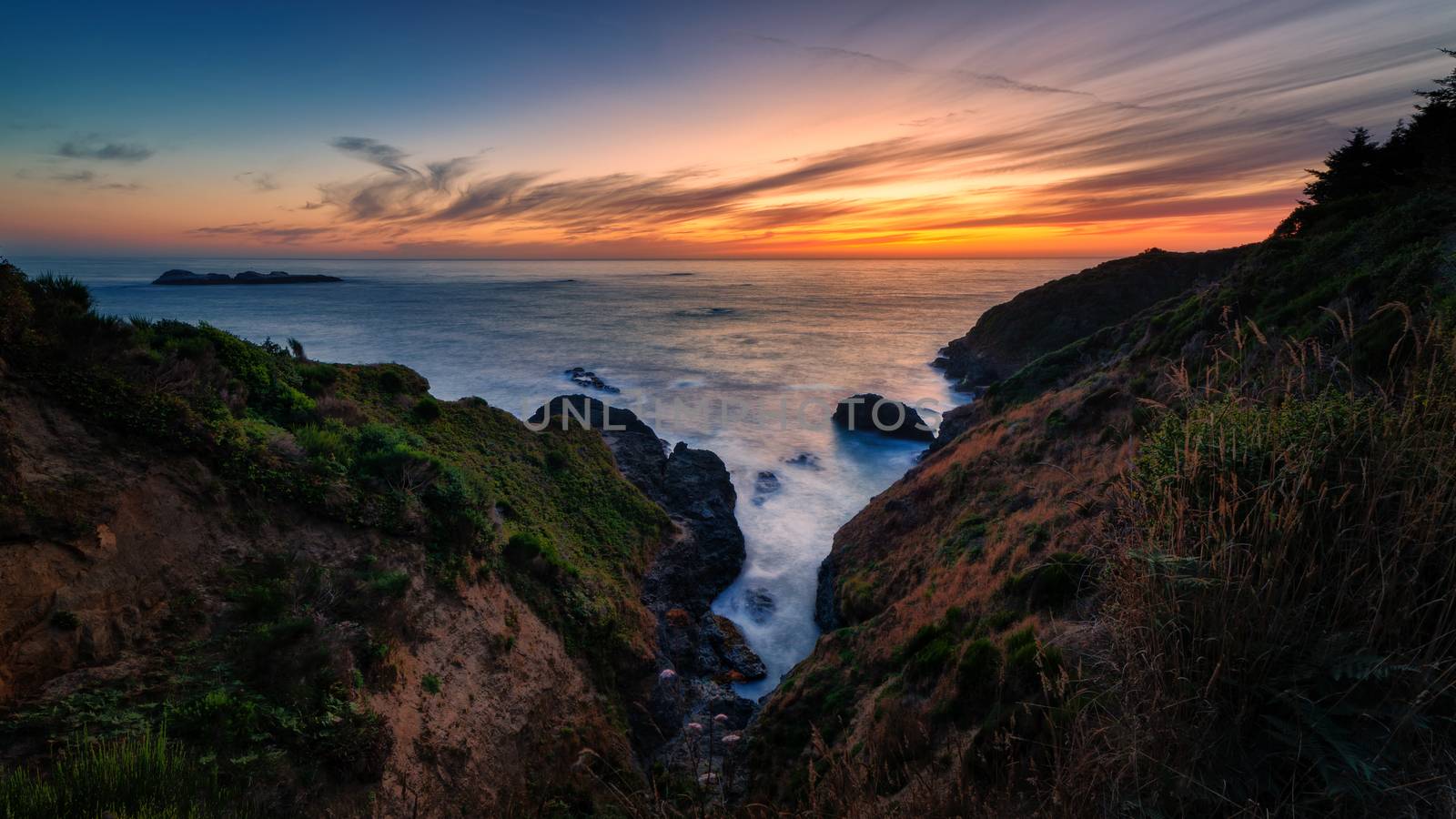 A Dramatic Sunset at the Beach, Color Image by backyard_photography