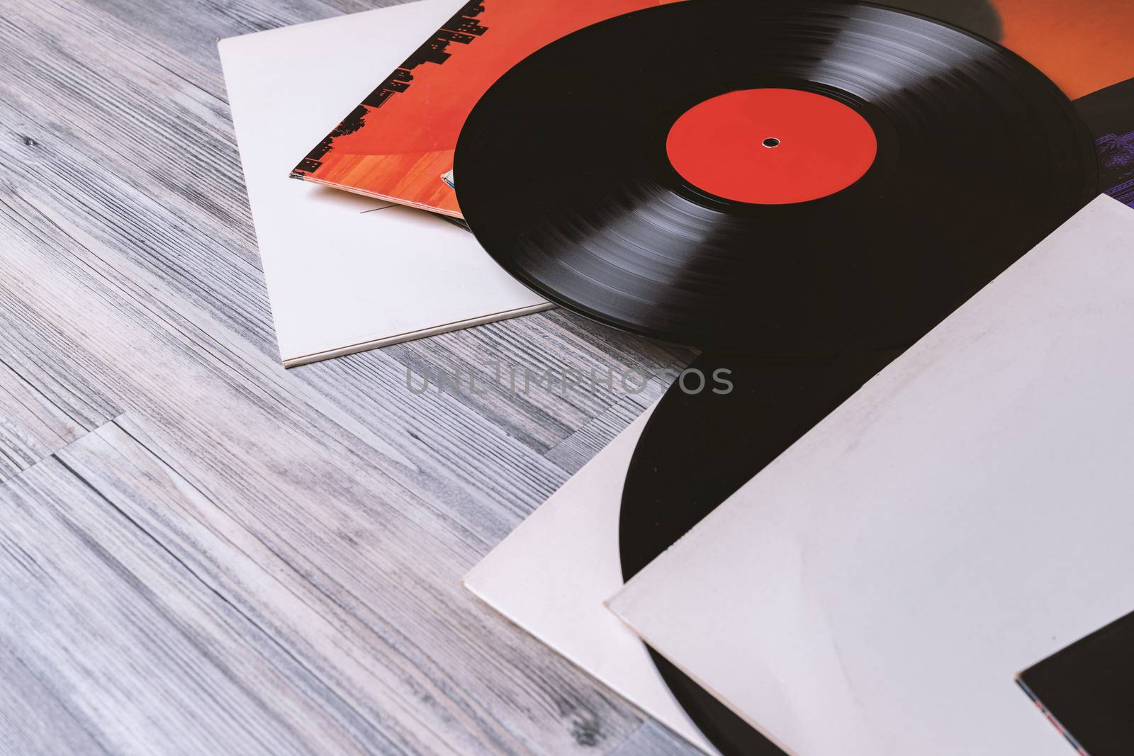 covers album and black vinyl record by Robertobinetti70