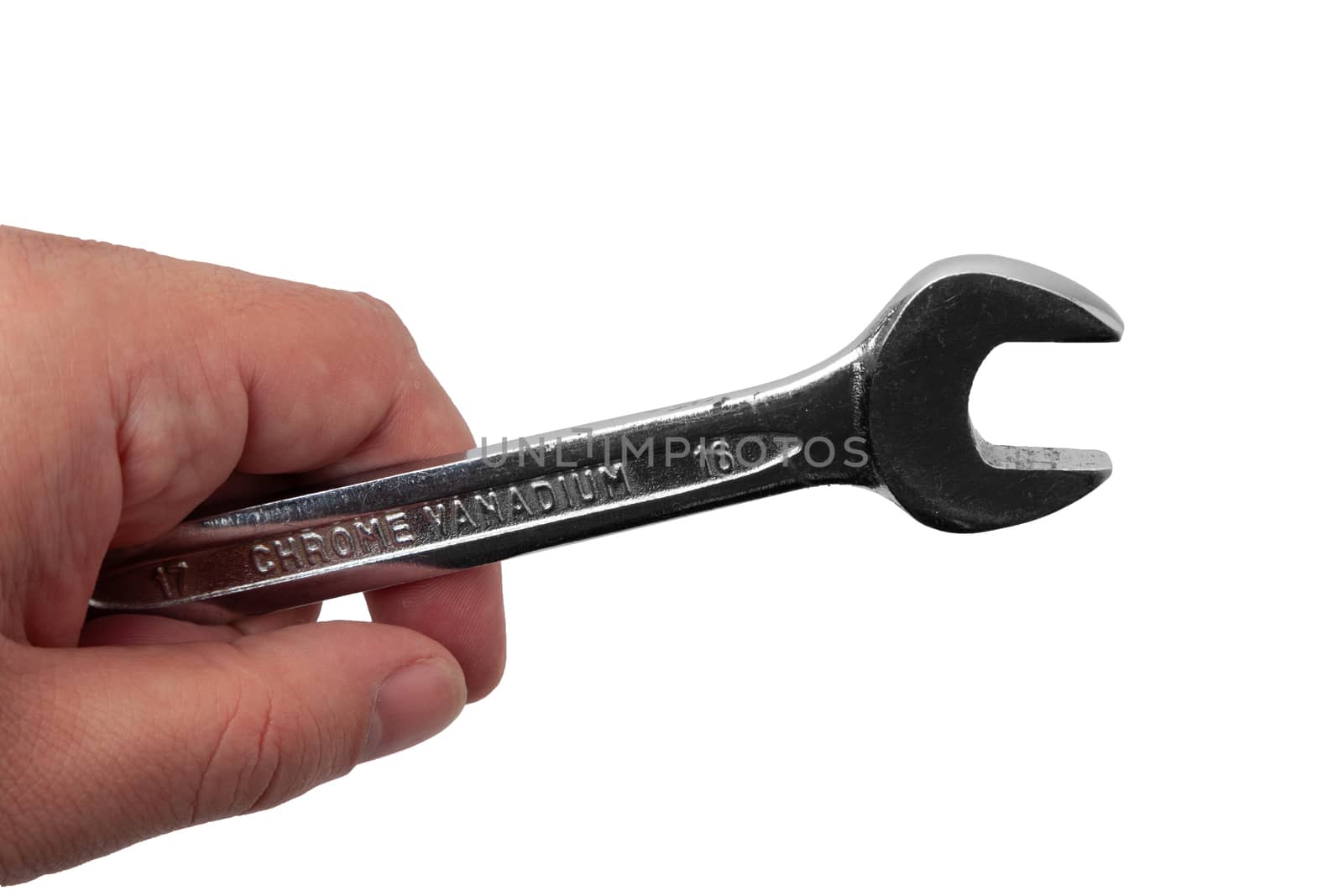 Close-up shot of a hand holding a wrench, isolated on white. With clipping path