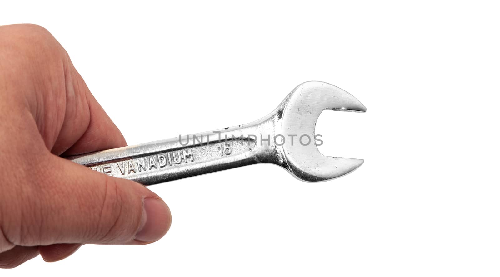 Close-up shot of a hand holding a wrench, isolated on white. With clipping path