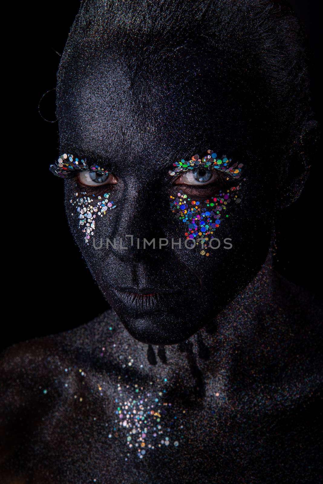 Girl in black makeup with sparkles by Multipedia