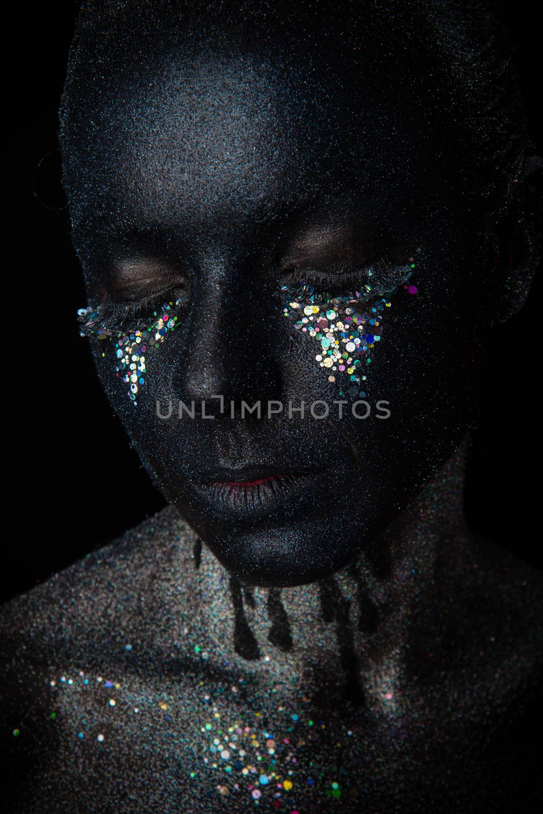 Girl in black makeup with sparkles by Multipedia