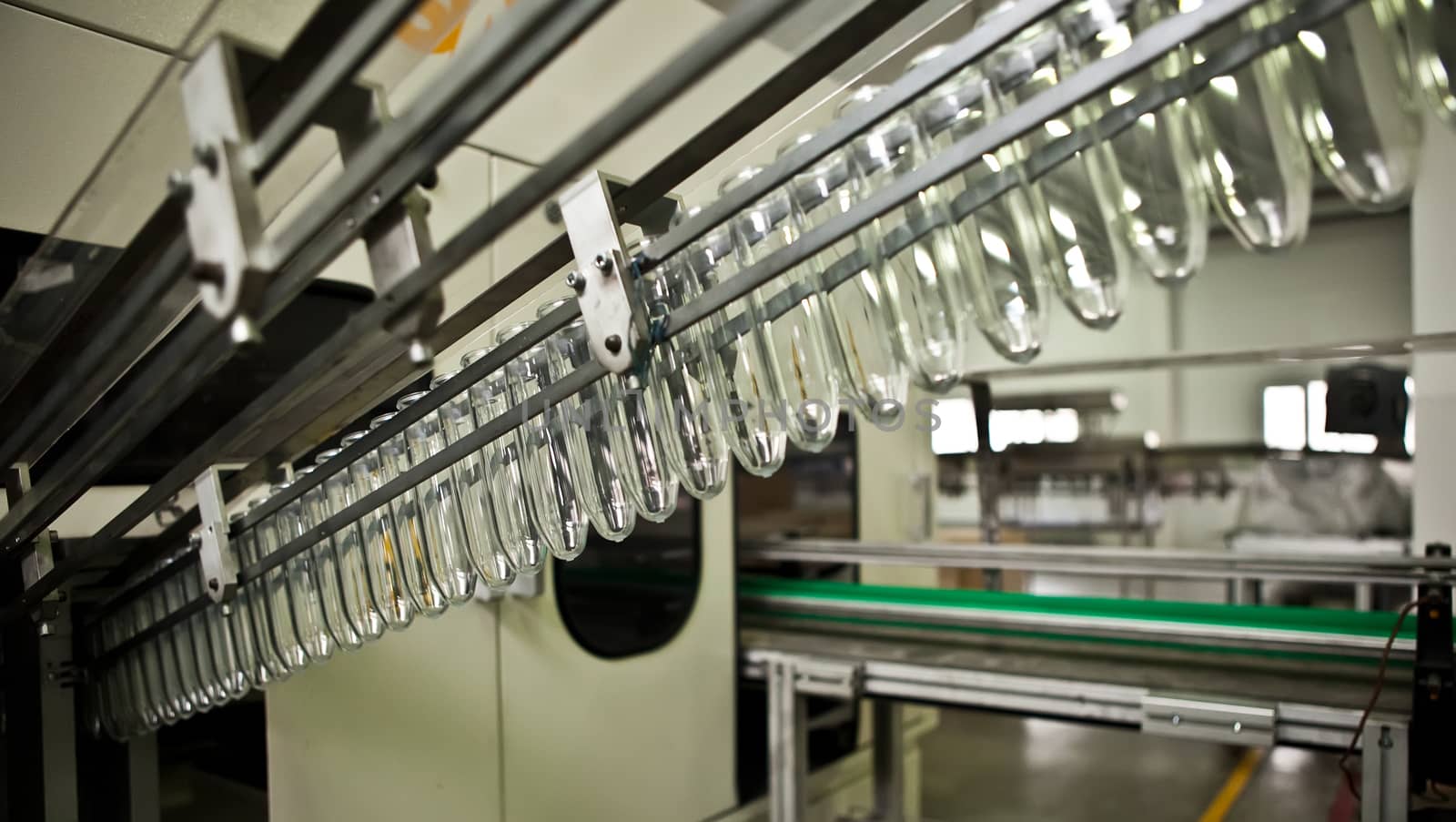 Production of the bottles plastic The Technological line on production of the plastic bottles. Conveyor automatic