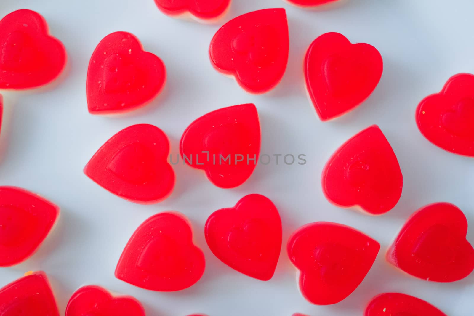 candy from marmalade in the shape of a pink heart by alexandr_sorokin