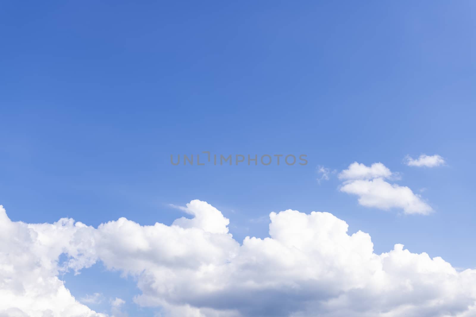 While Clouds over Blue Sky Background by viscorp