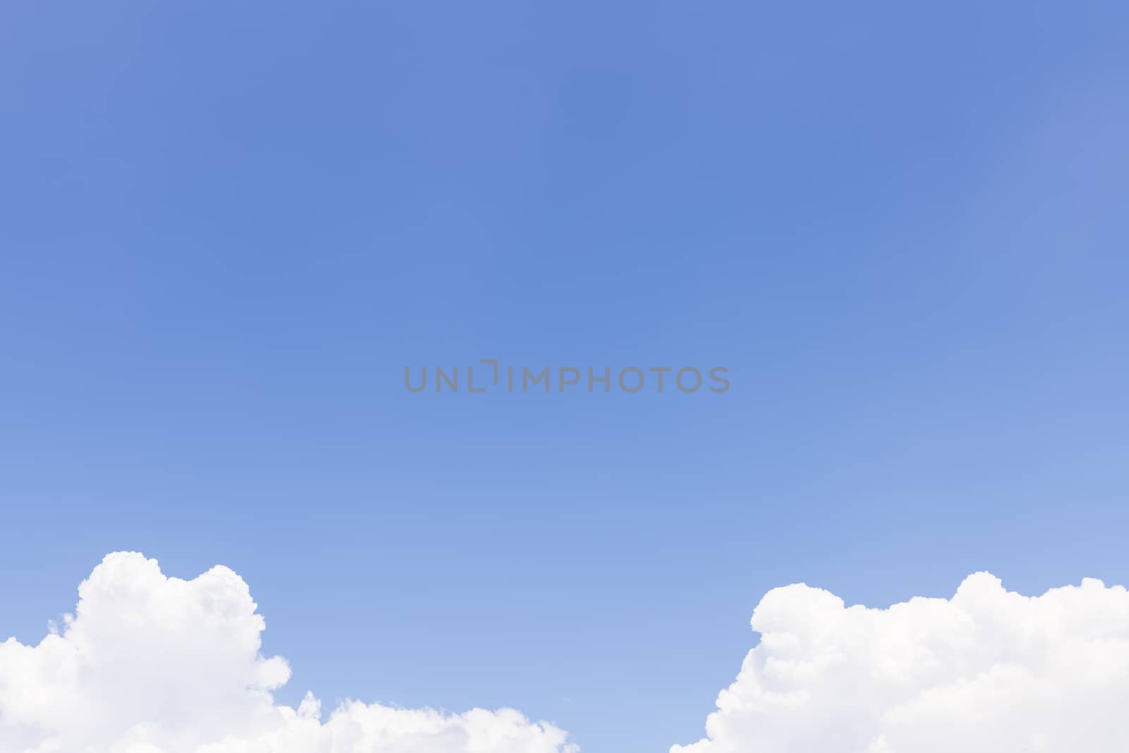 While Clouds over Blue Sky Background by viscorp