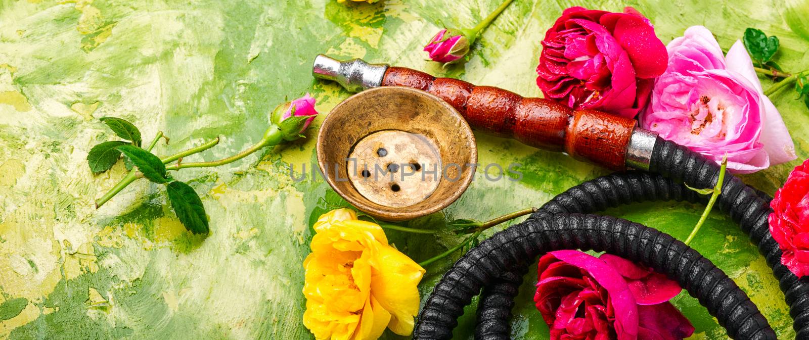 Smoking hookah with floral tobacco flavor.East kalian