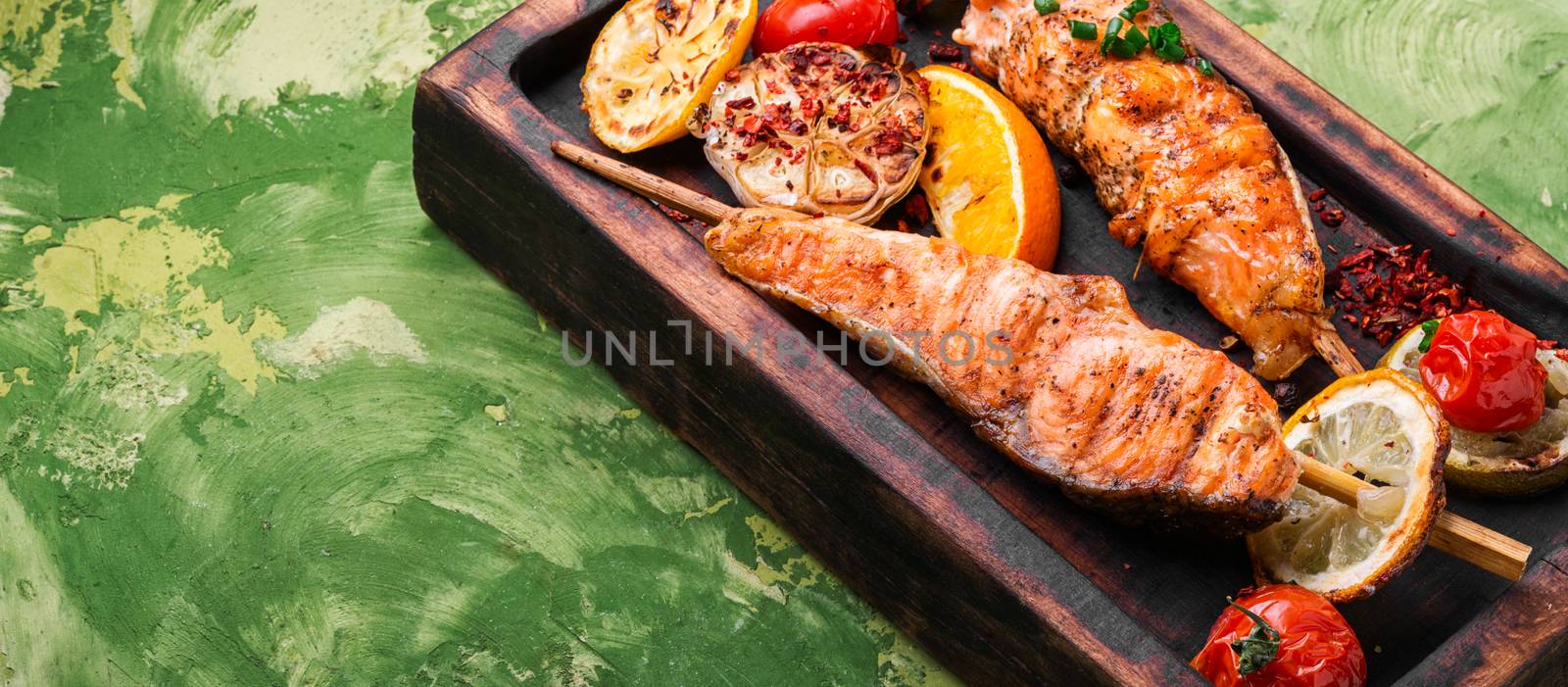 Barbecue skewers with fish.Grill salmon shish kebab