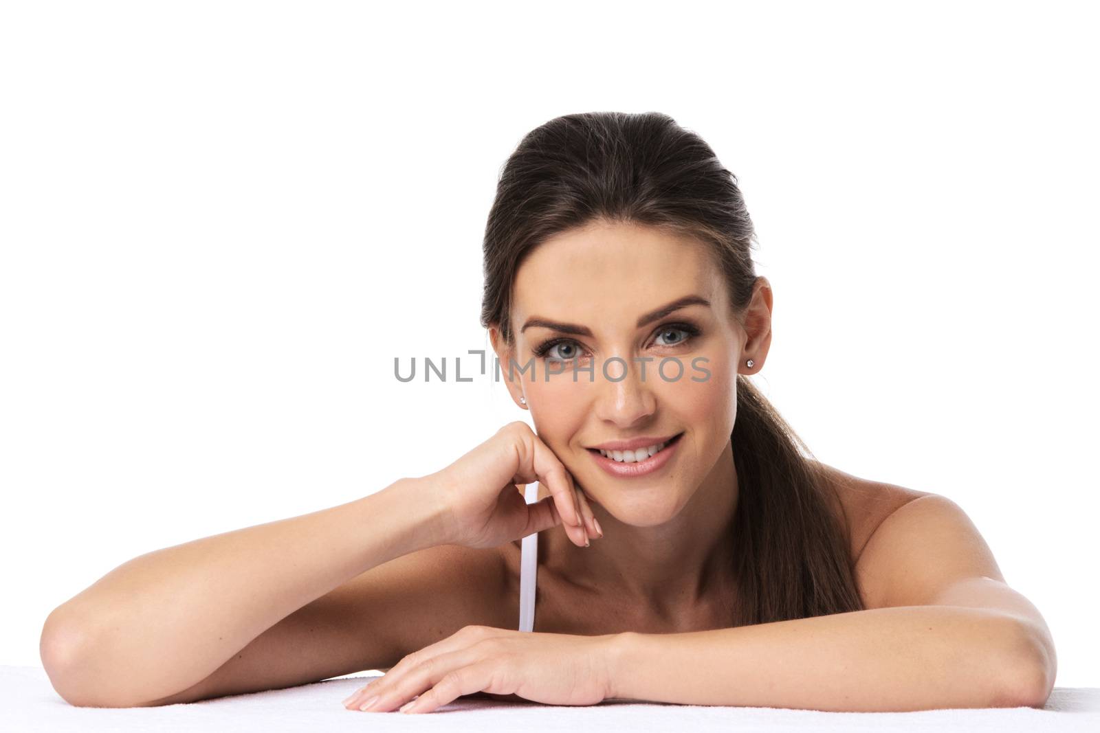 Portrait of young woman with perfect skin isolated on white background