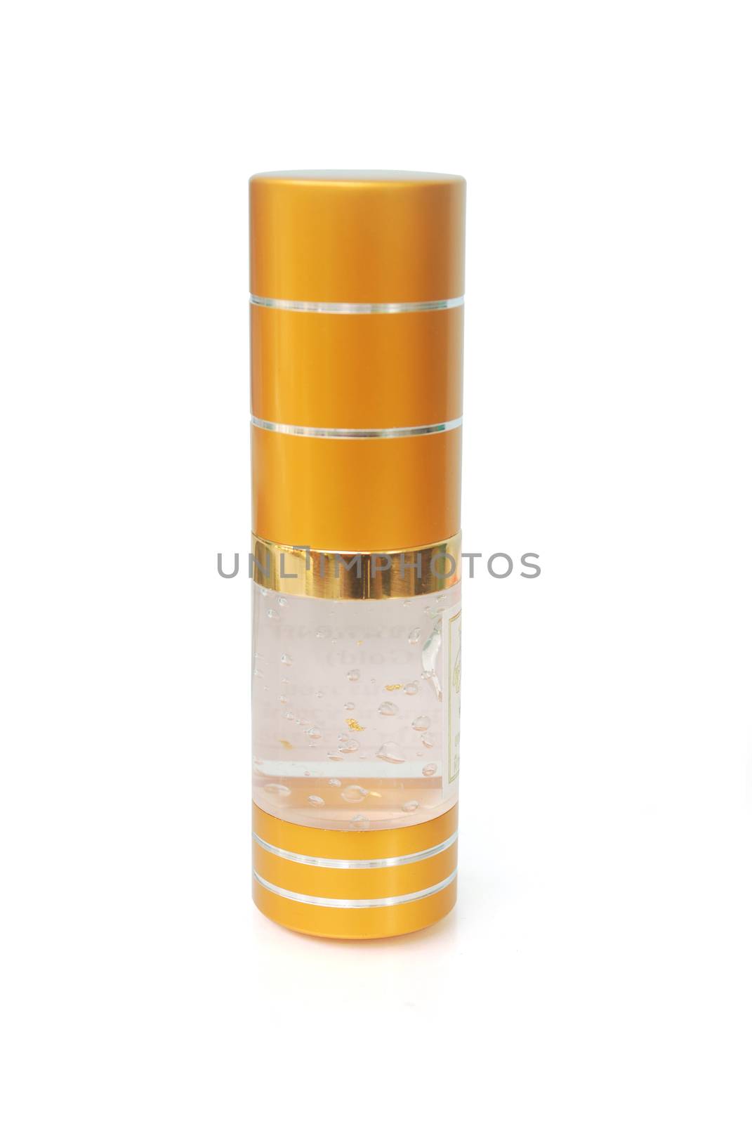 Serum mixed with gold on white background.(with Clipping Path).