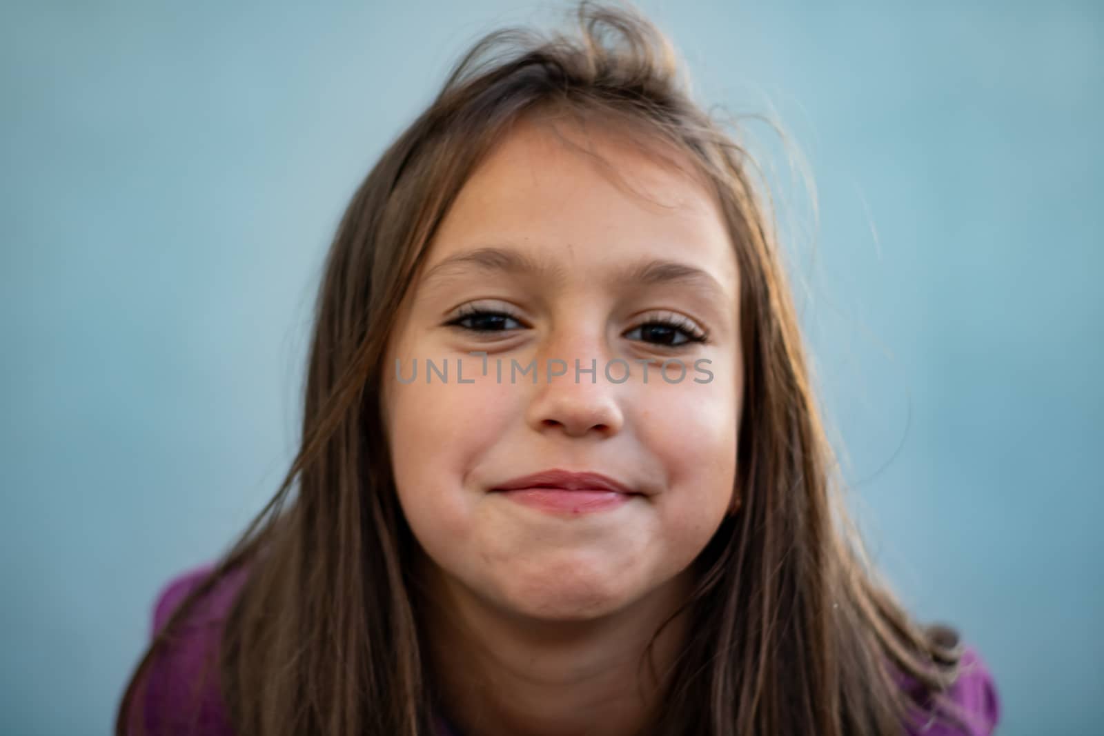Portrait of little girl posing smiling