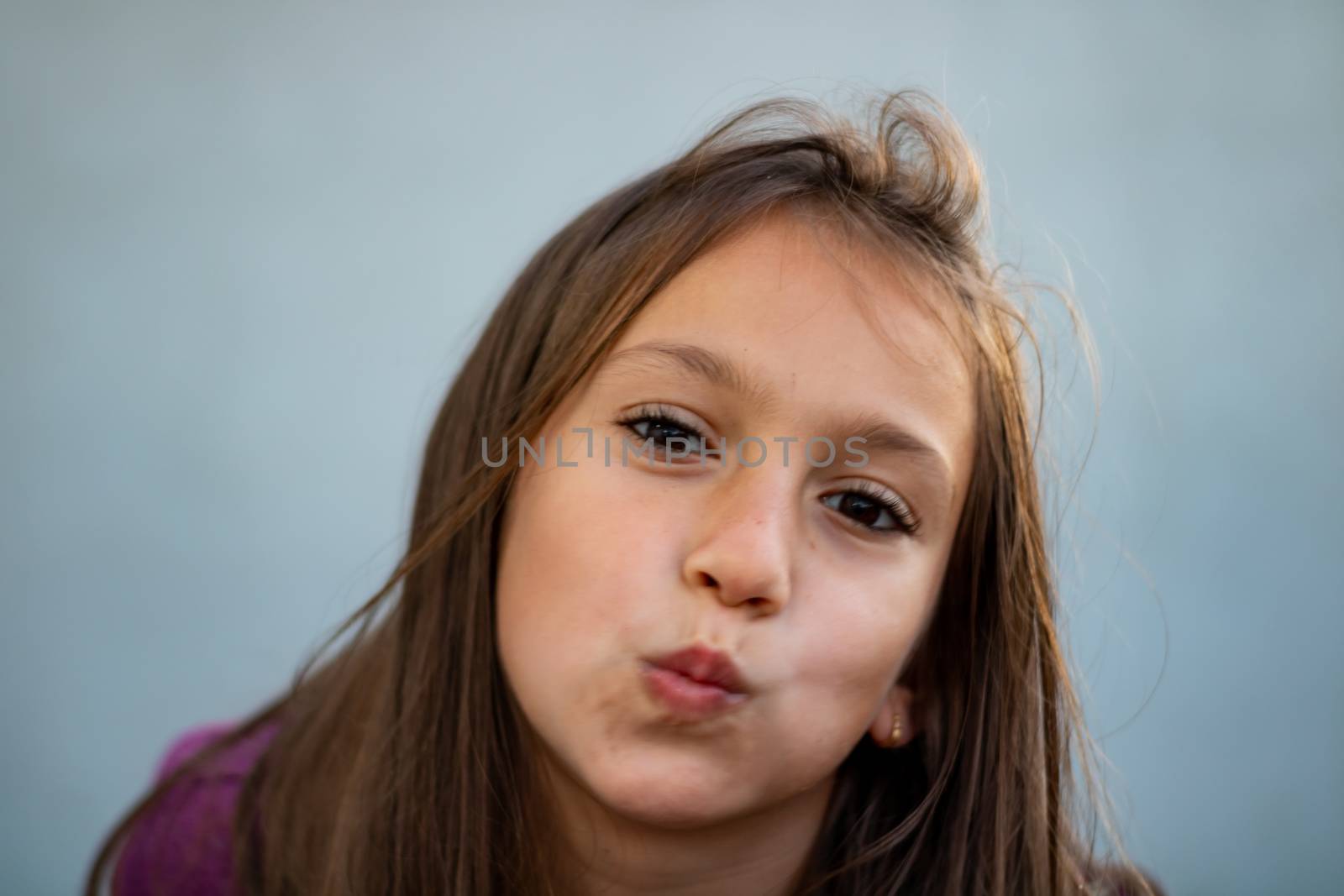 Portrait of little girl posing smiling
