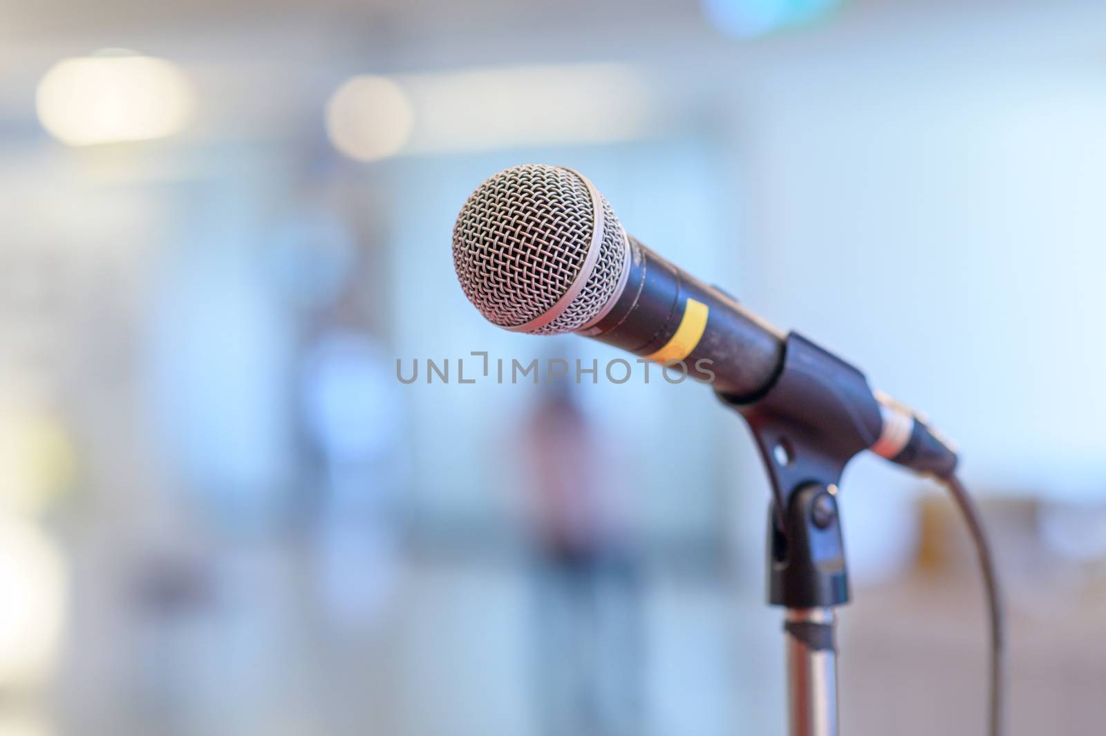 communication microphone on stage against a background of auditorium Concert stage