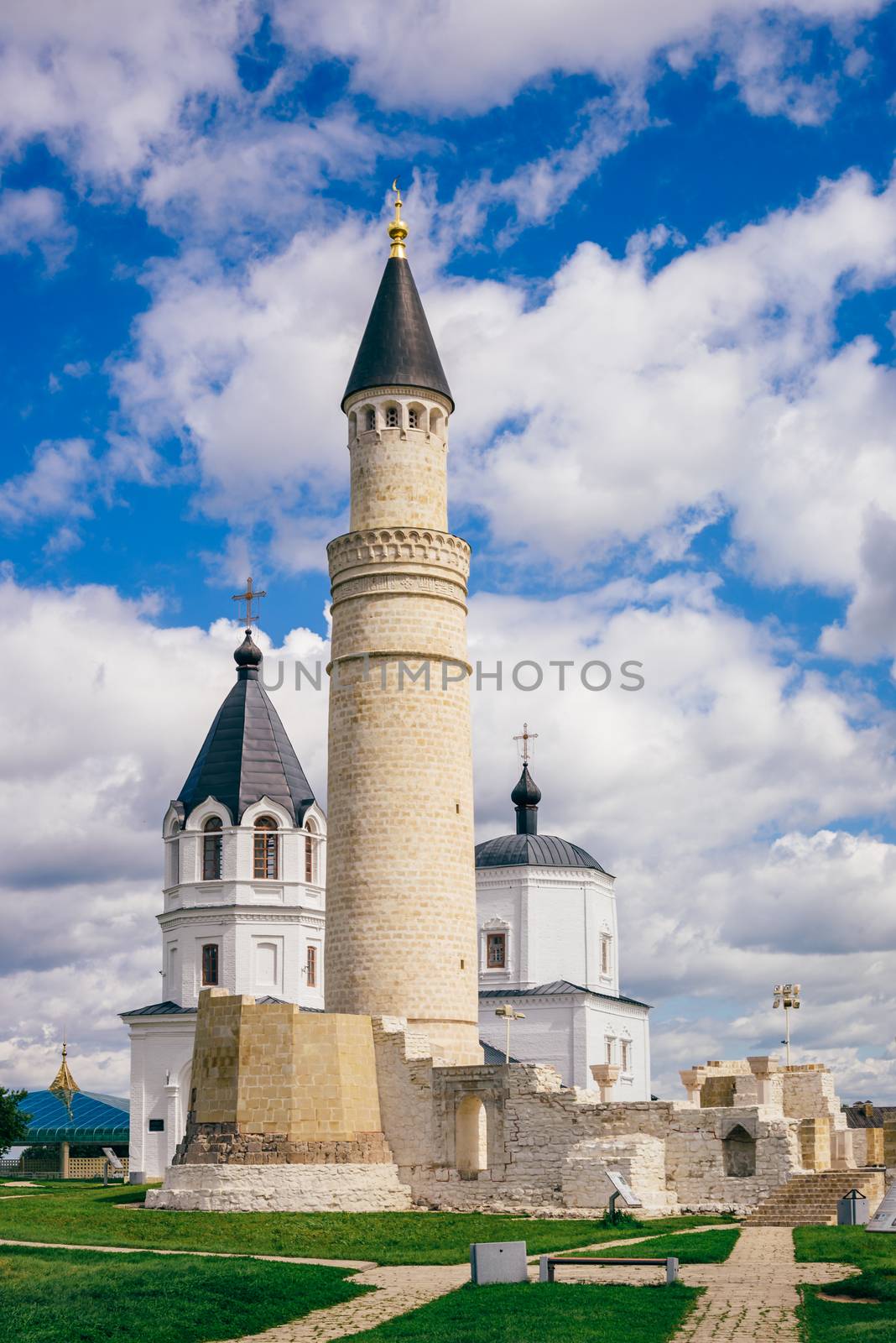 Ruins of Cathedral Mosque with Big Minaret. Dormition Church on Background. Bolghar, Russia.