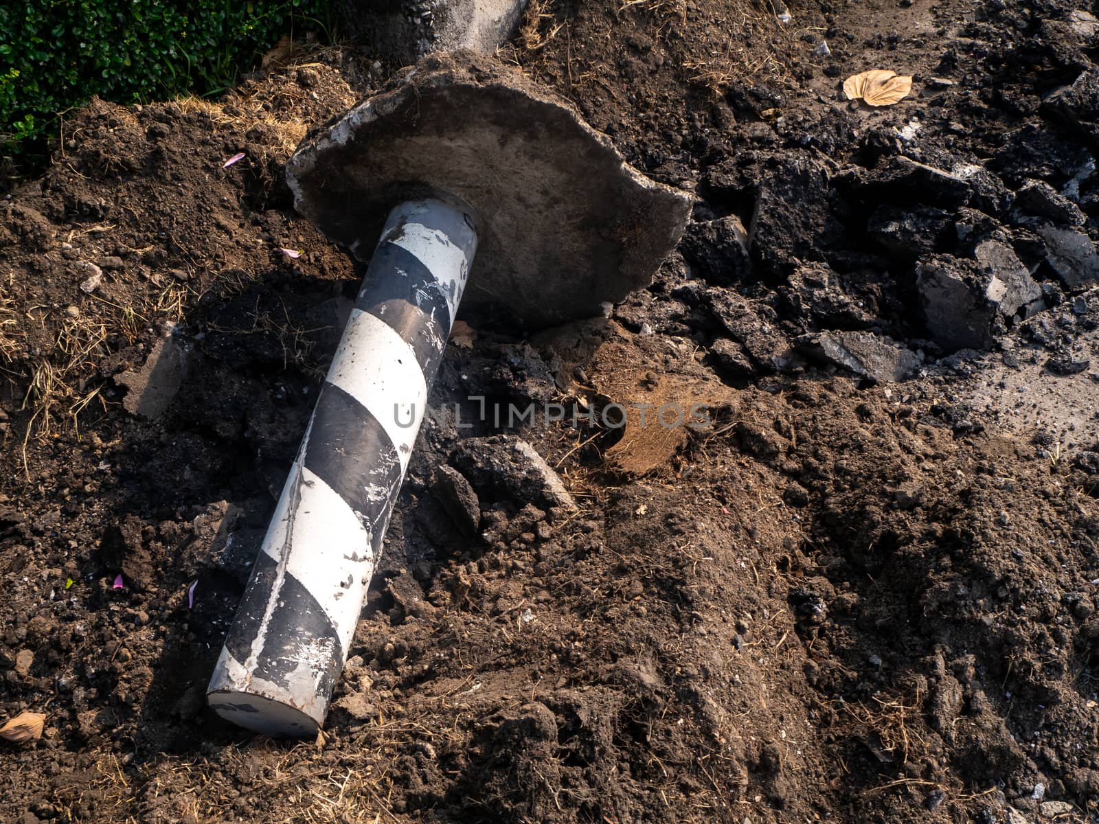 the Road repairing works with jackhammer. machine drills asphalt by shutterbird