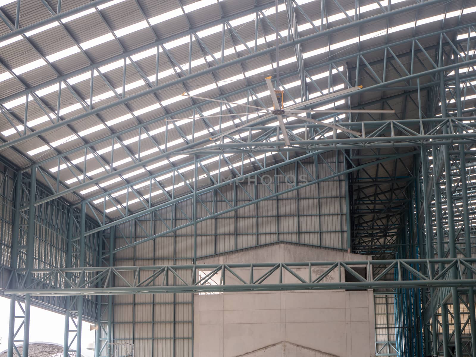 Big warehouse steel plate roof ceiling structure, with iron beams, perspective background, as shadow reflection from glass tile wall