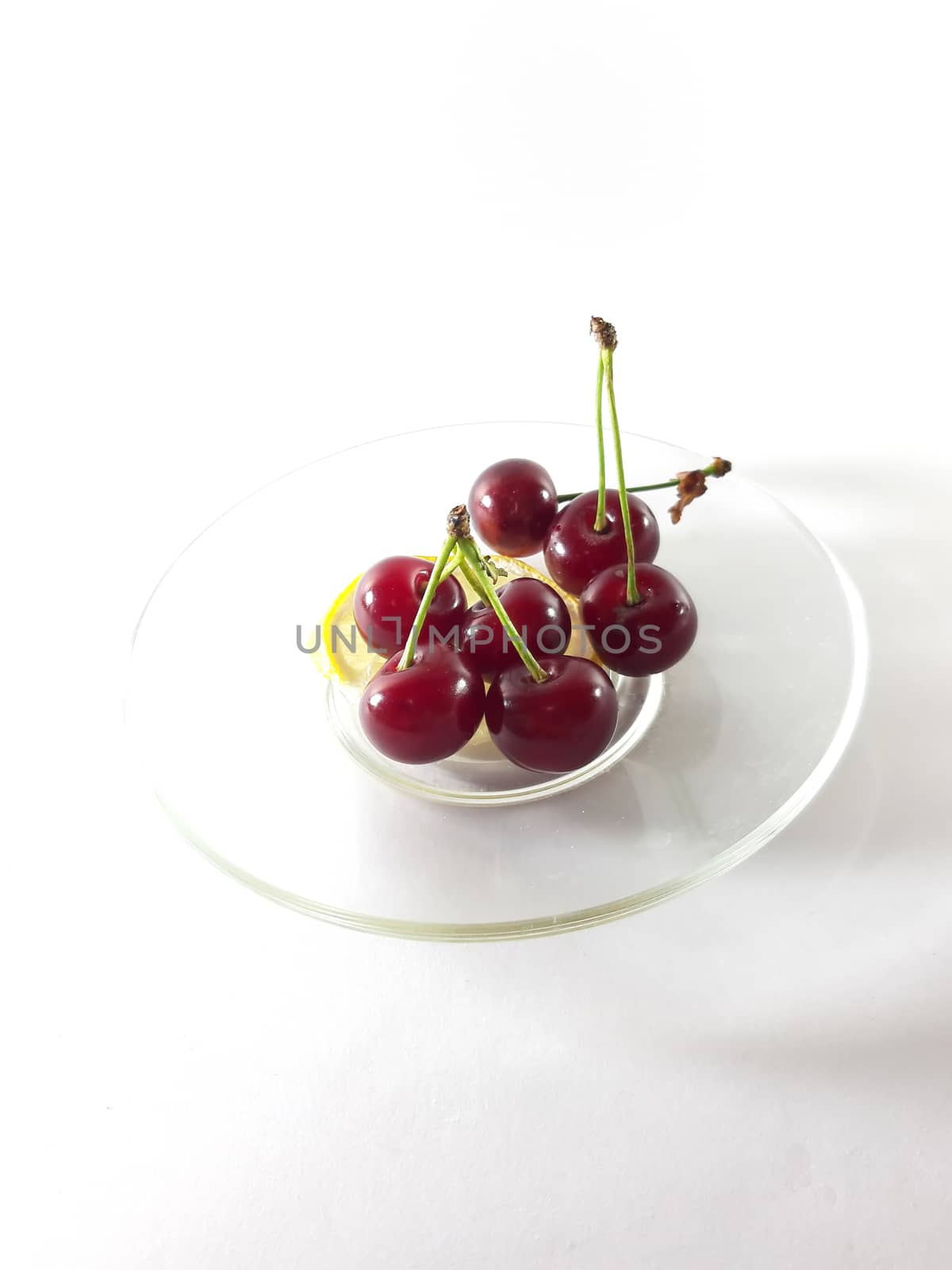 Photo cherry and lemon. Healthy food. Vegetarian red food. Berri by polyachenkovv@gmail.com