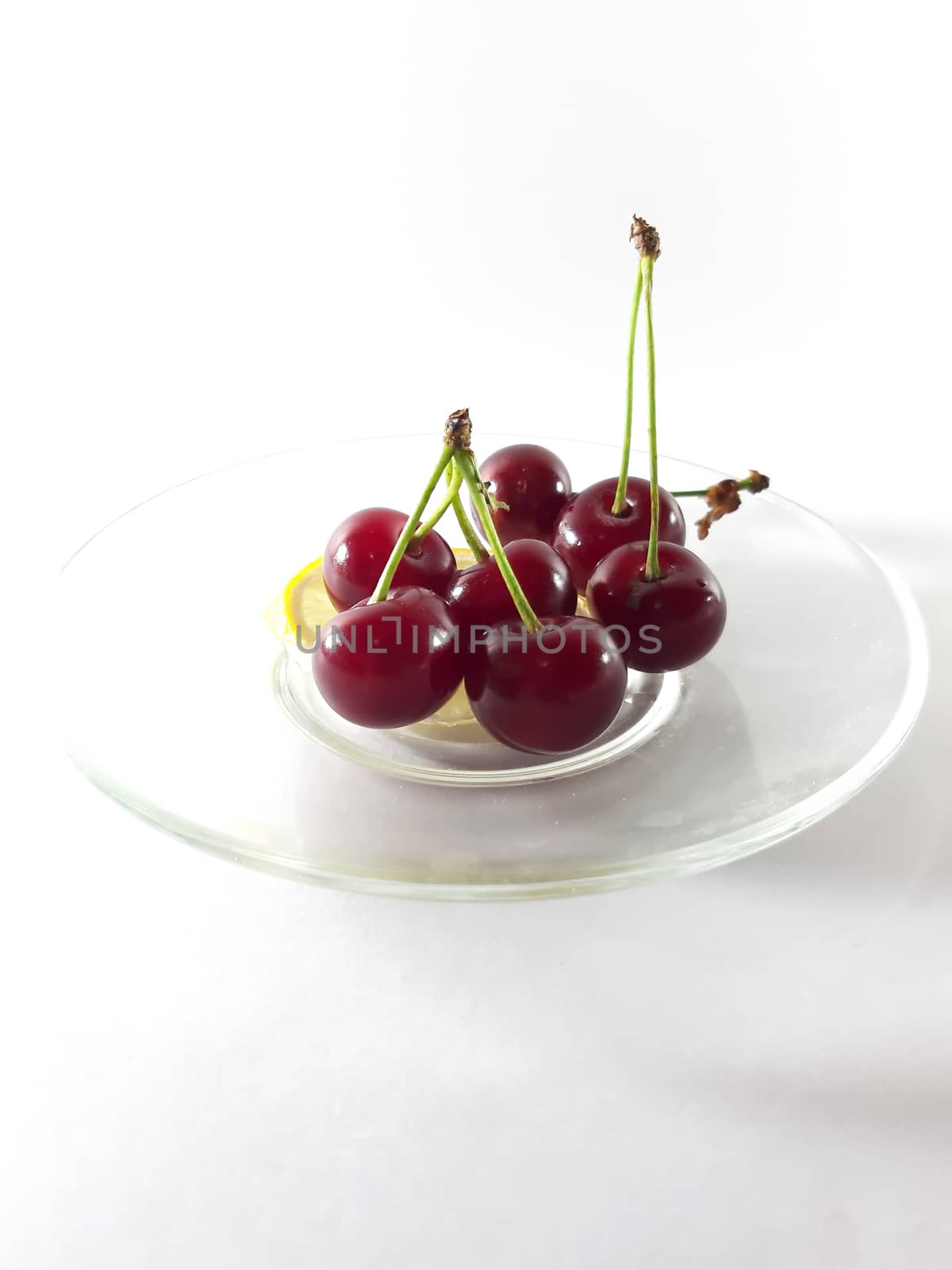 Photo cherry and lemon. Healthy food. Vegetarian red food. Berri by polyachenkovv@gmail.com