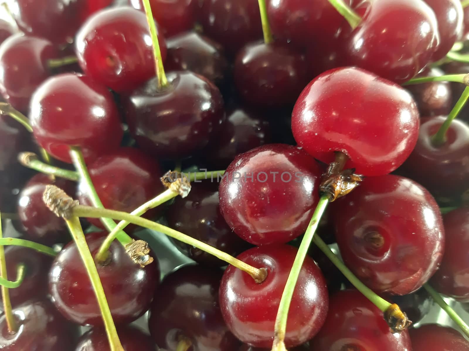 Background red cherry . Photo healthy food. Vegetarian red food. by polyachenkovv@gmail.com