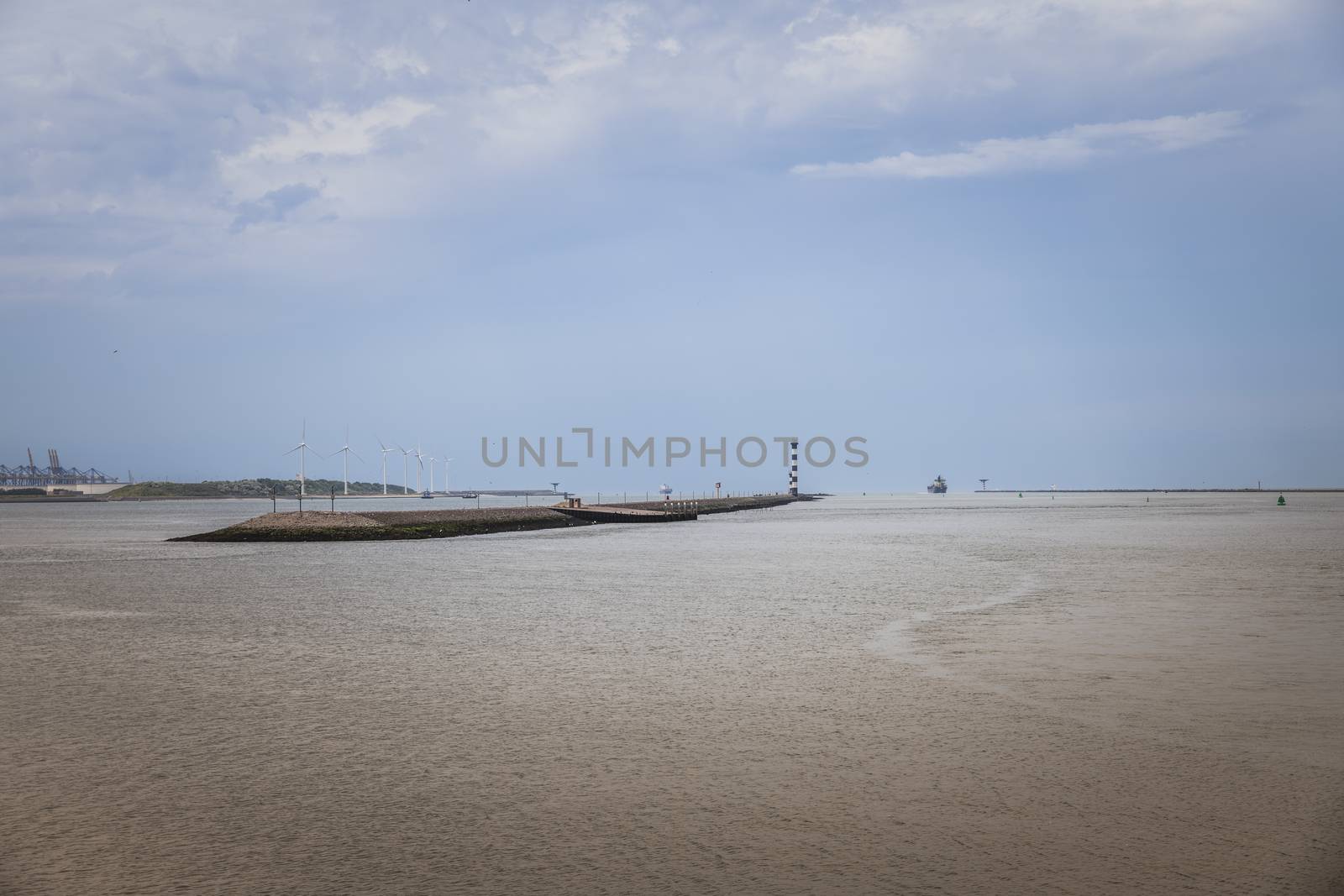 entrance to the harbor of europoort rotterdam form the nothsea to the waterweg river , the port name is maasvlakte or rotterdam port