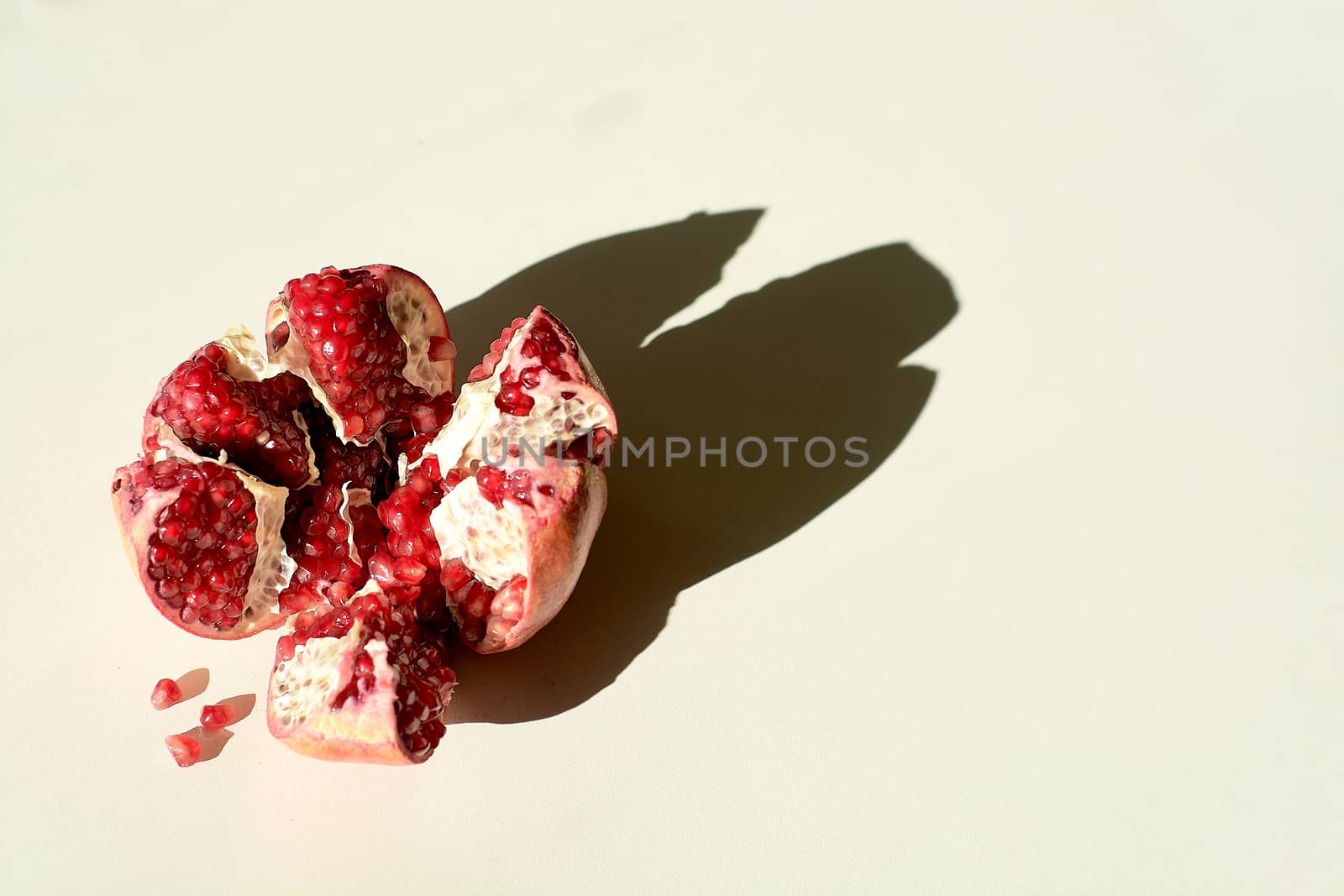Ripe red juicy pomegranate. Grains pomegranate fruit. by nixrenas