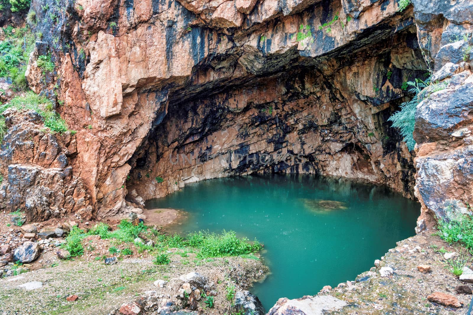 The Grotto of the God Pan 3rd Century BCE filled with water ,Hermon Stream Nature reserve and Archaeological Park ,Banias, Golan Heights Israel