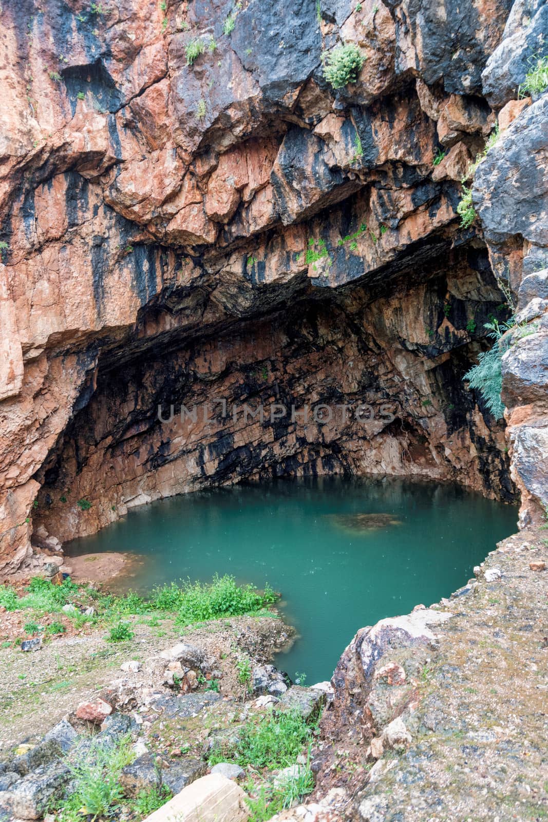 The Grotto of the God Pan 3rd Century BCE filled with water ,Hermon Stream Nature reserve and Archaeological Park ,Banias, Golan Heights Israel