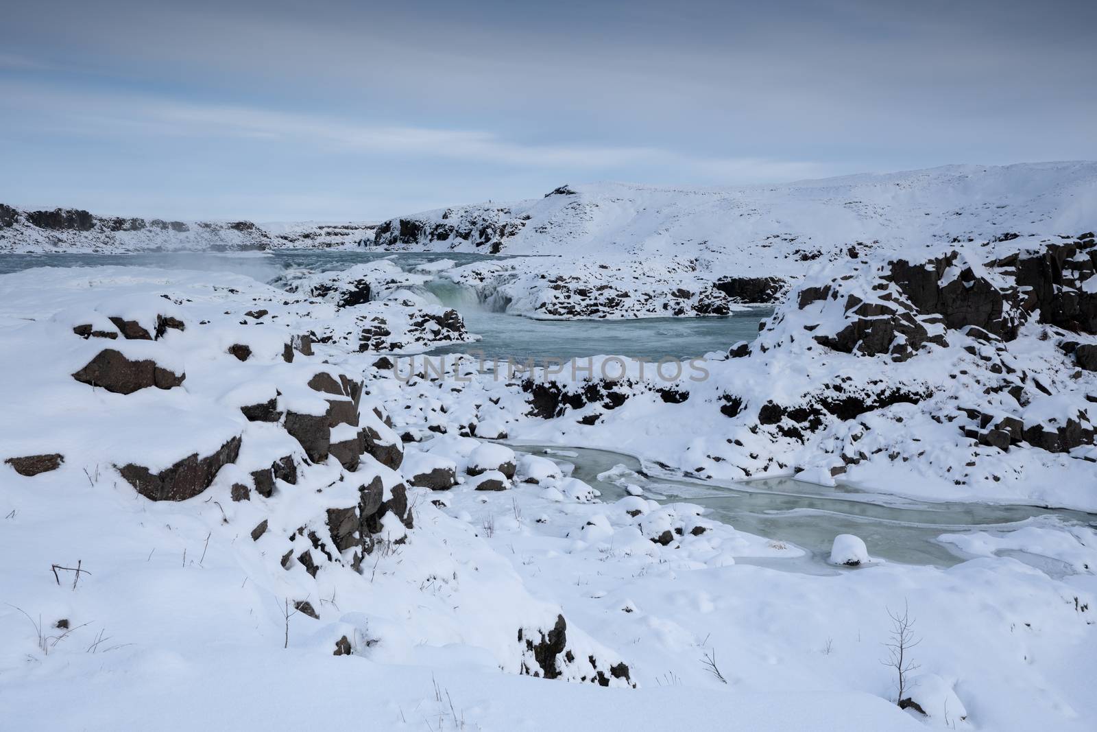 Panoramic image of the frozen waterfall Urridafoss, Iceland, Europe